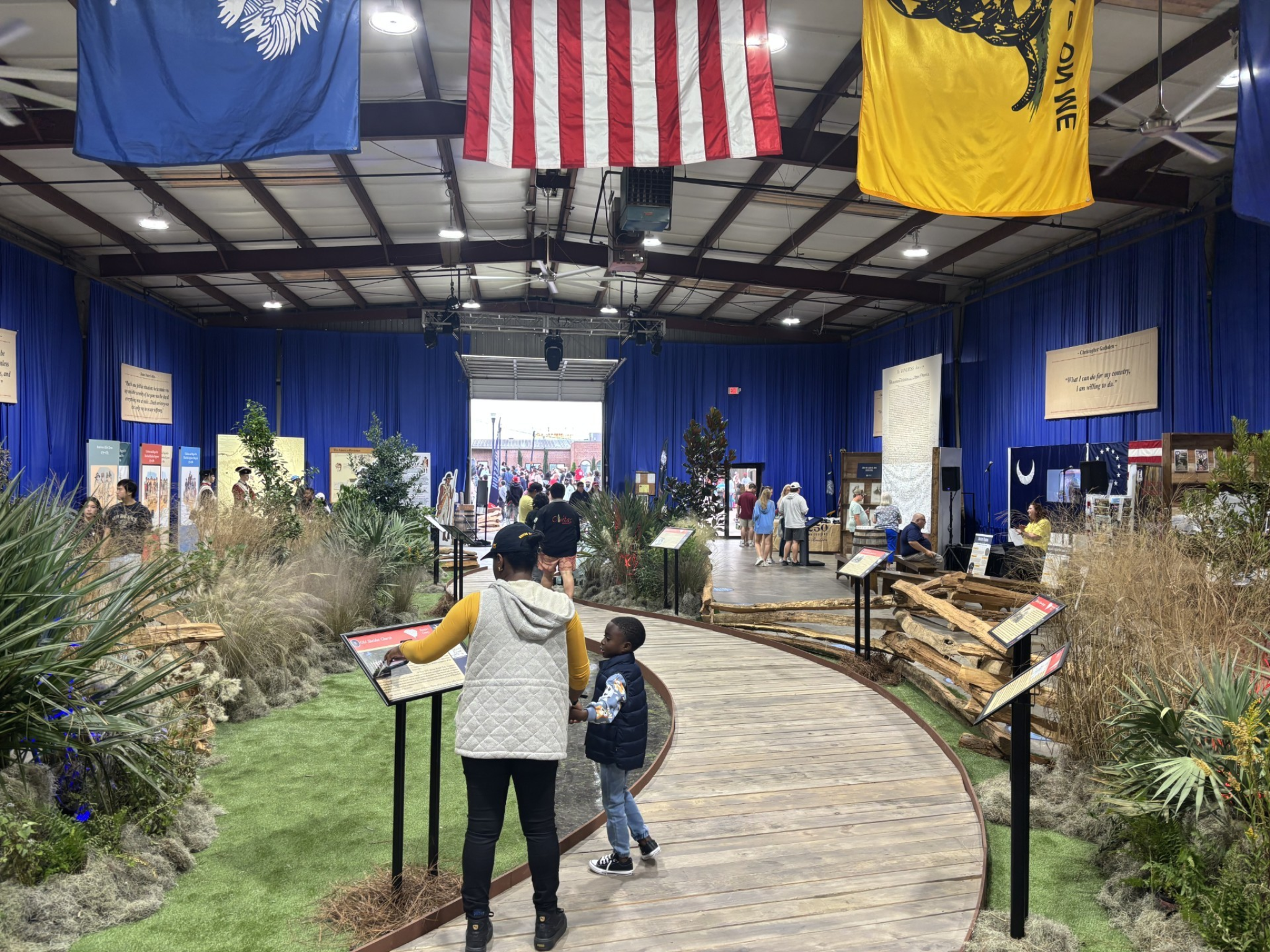 SC250 exhibit feature artwork and event poster details